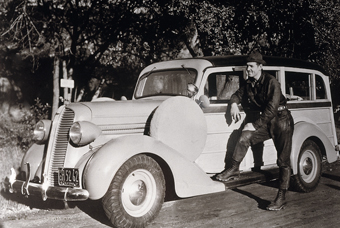 Gable with 1937 Ford station wagon